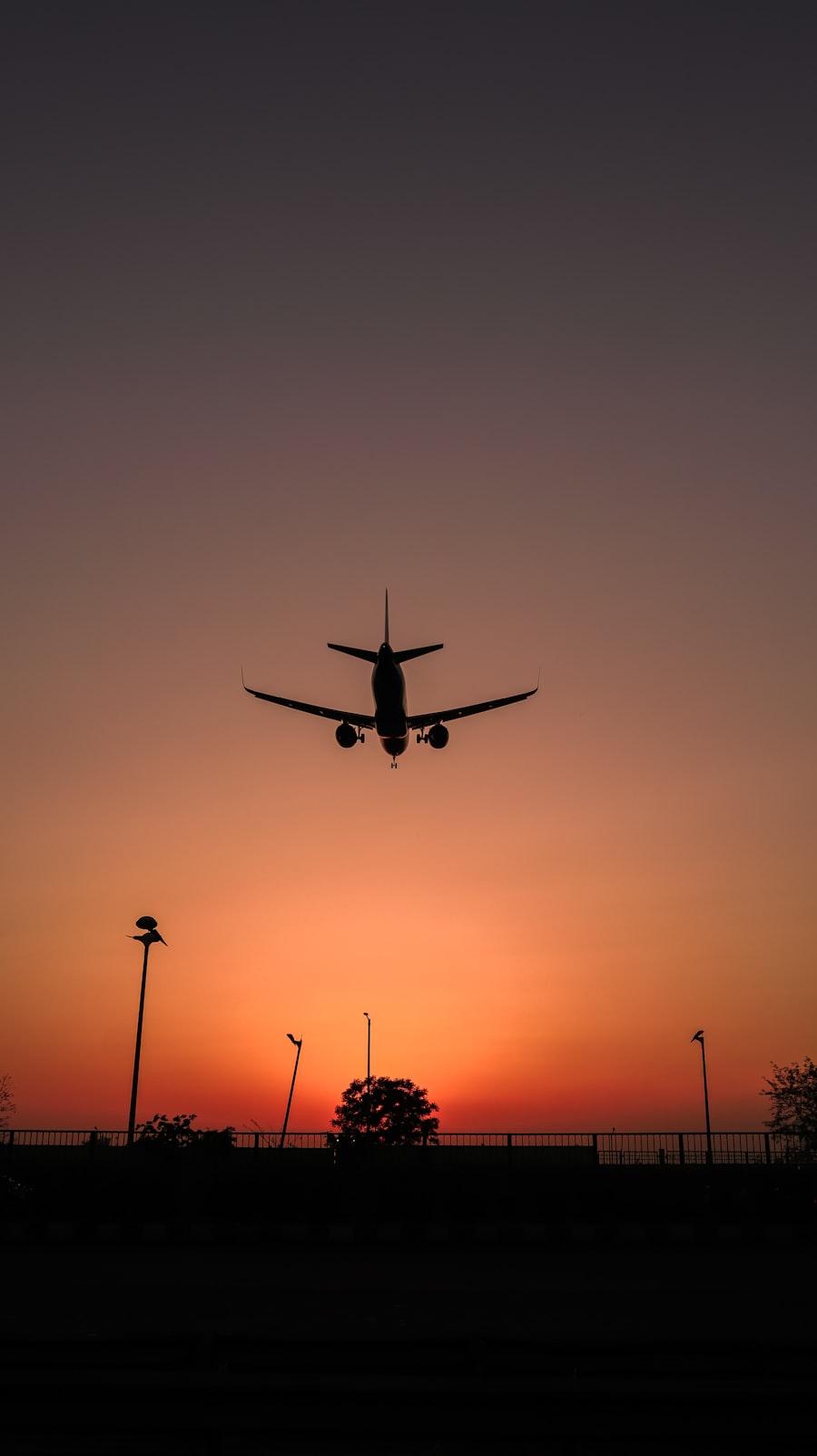 Silhouette of an aircraft flying against a sunset sky, representing the Commercial Pilot Program